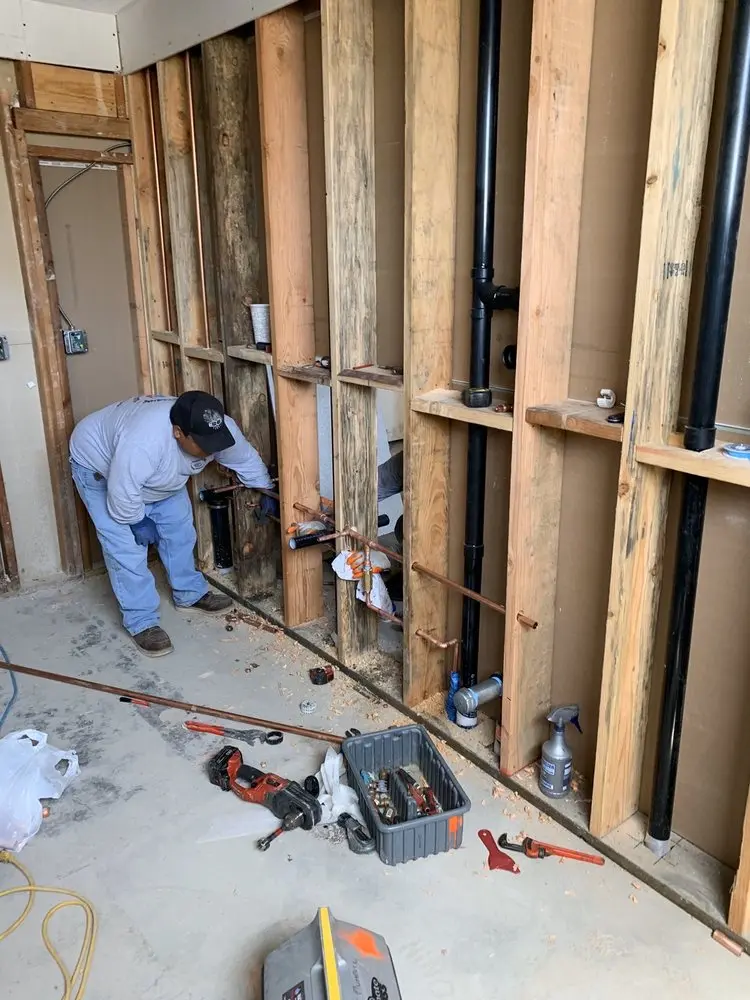Commercial rough-in plumbing for Water Heater Replacement in Rush Valley